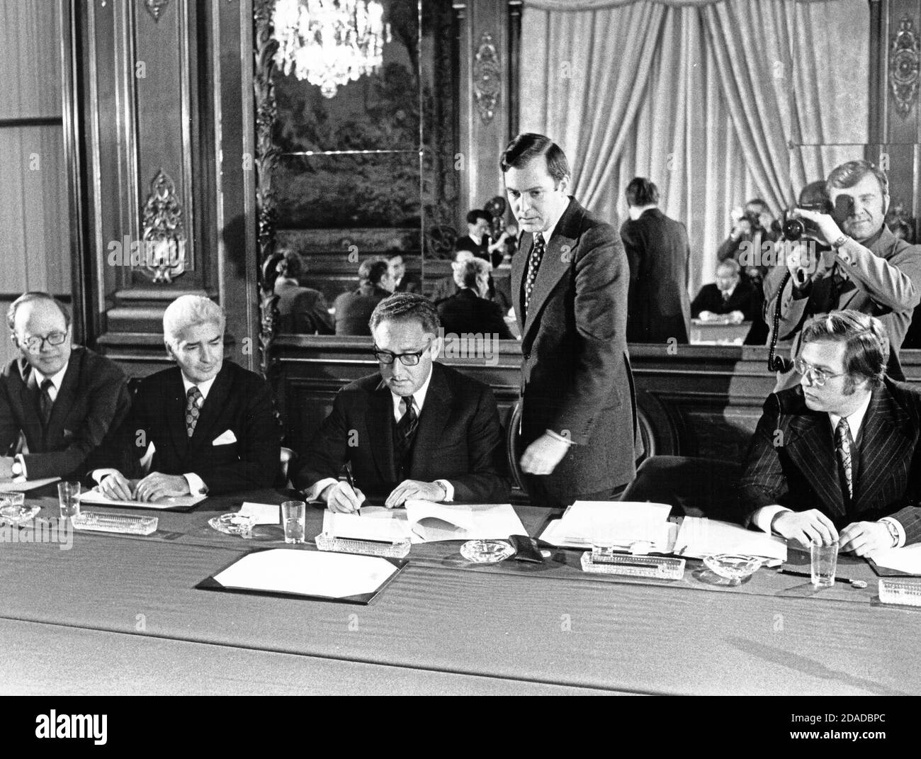 In this photo released by the White House, Assistant to the President (Nixon) for National Security Affairs Henry A. Kissinger, center, initials the Vietnam Peace Agreement in the International Conference Center in Paris France on Tuesday, January 23, 1973.Mandatory Credit: Robert L. Knudsen / White House via CNP / MediaPunch Stock Photo
