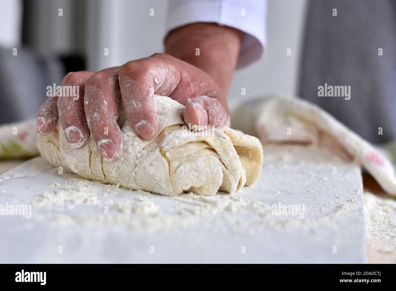 https://c8.alamy.com/comp/2DADCTJ/bread-making-process-closeup-of-man-hands-kneading-dough-baker-cooking-pastry-culinary-courses-and-food-preparation-2DADCTJ.jpg