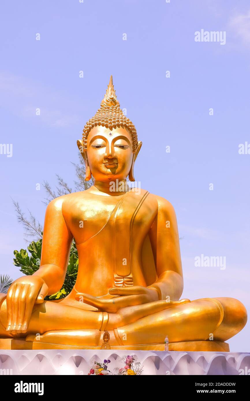 Golden statue of sitting Buddha at temple.large Buddha image that is