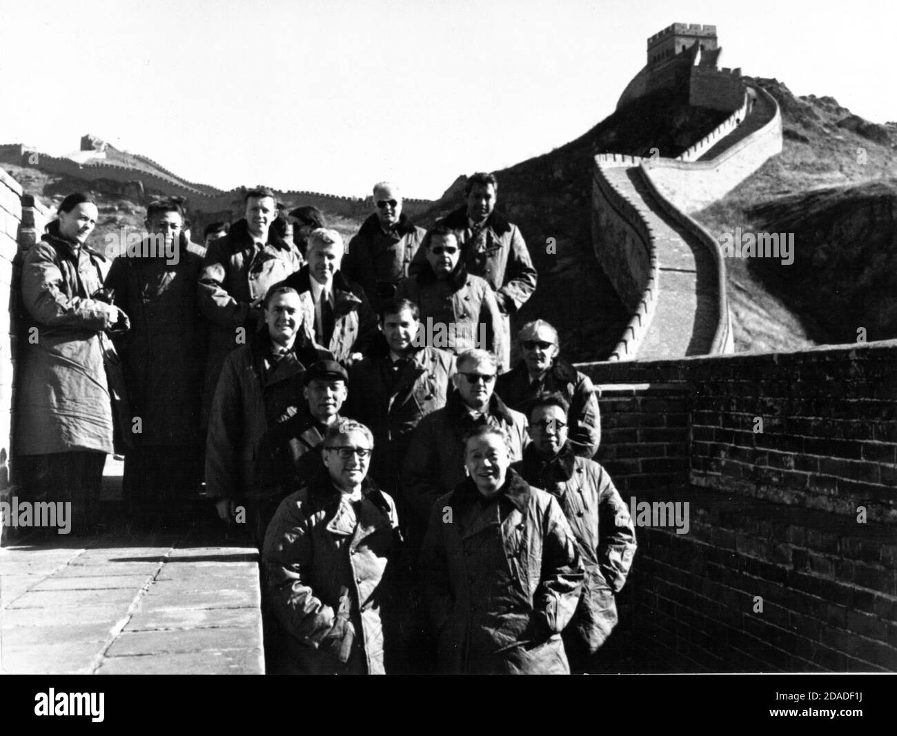 In this photo released by the White House, this picture taken October 22, 1971 at the Great Wall of China.  From left to right: Front row -- Henry A. Kissinger, Assistant to the President (Nixon) for National Security Affairs; Chi P'eng-fei, Acting Foreign Minister (of the People's Republic of China) and an interpreter.  Second row -- Hsiung Hsiang-hui, Secretary to the Prime Minister (of the Peoples Republic of China); John Ready, (United States) Secret Service.  Third row -- Brigadier General J.D. Hughes, Military Assistant to the President (Nixon); Dwight L. Chapin, Deputy Assistant to the Stock Photo