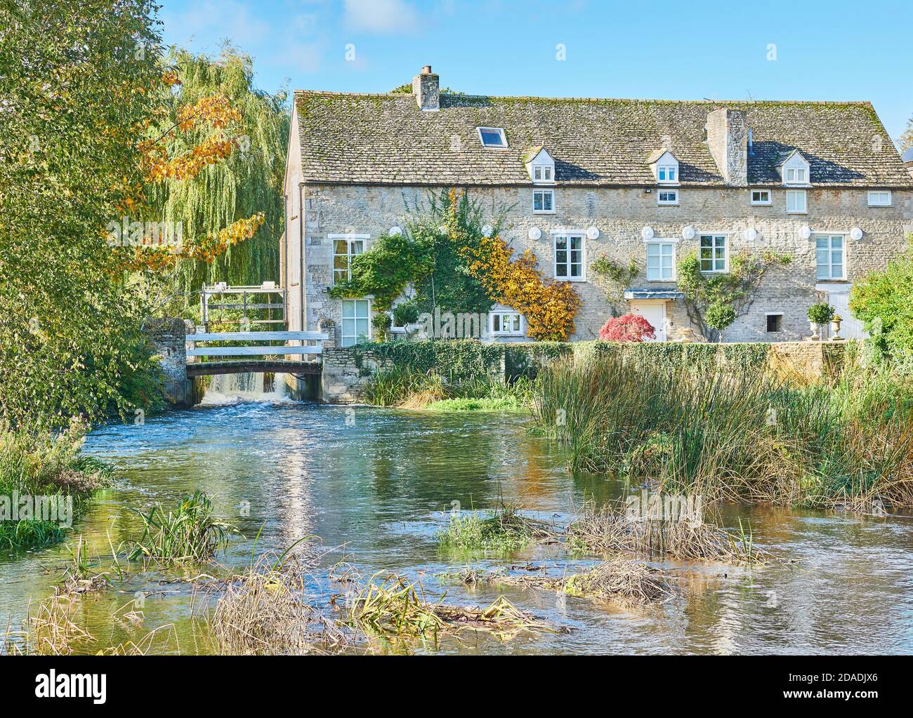 Converted mill on the river Nene in the village of Wadenhoe, England. Stock Photo