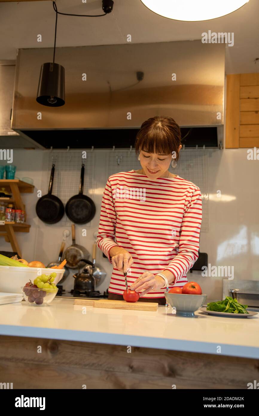 Kitchen woman cooking japanese hi-res stock photography and images - Alamy