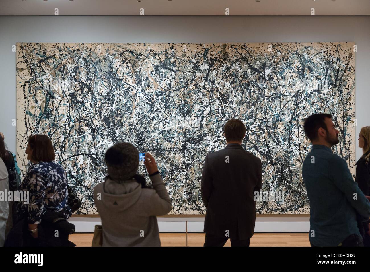 NEW YORK, USA - May 01, 2016: People inside Museum of Modern Art. MoMAs collection offers an overview of modern and contemporary art, architecture, de Stock Photo