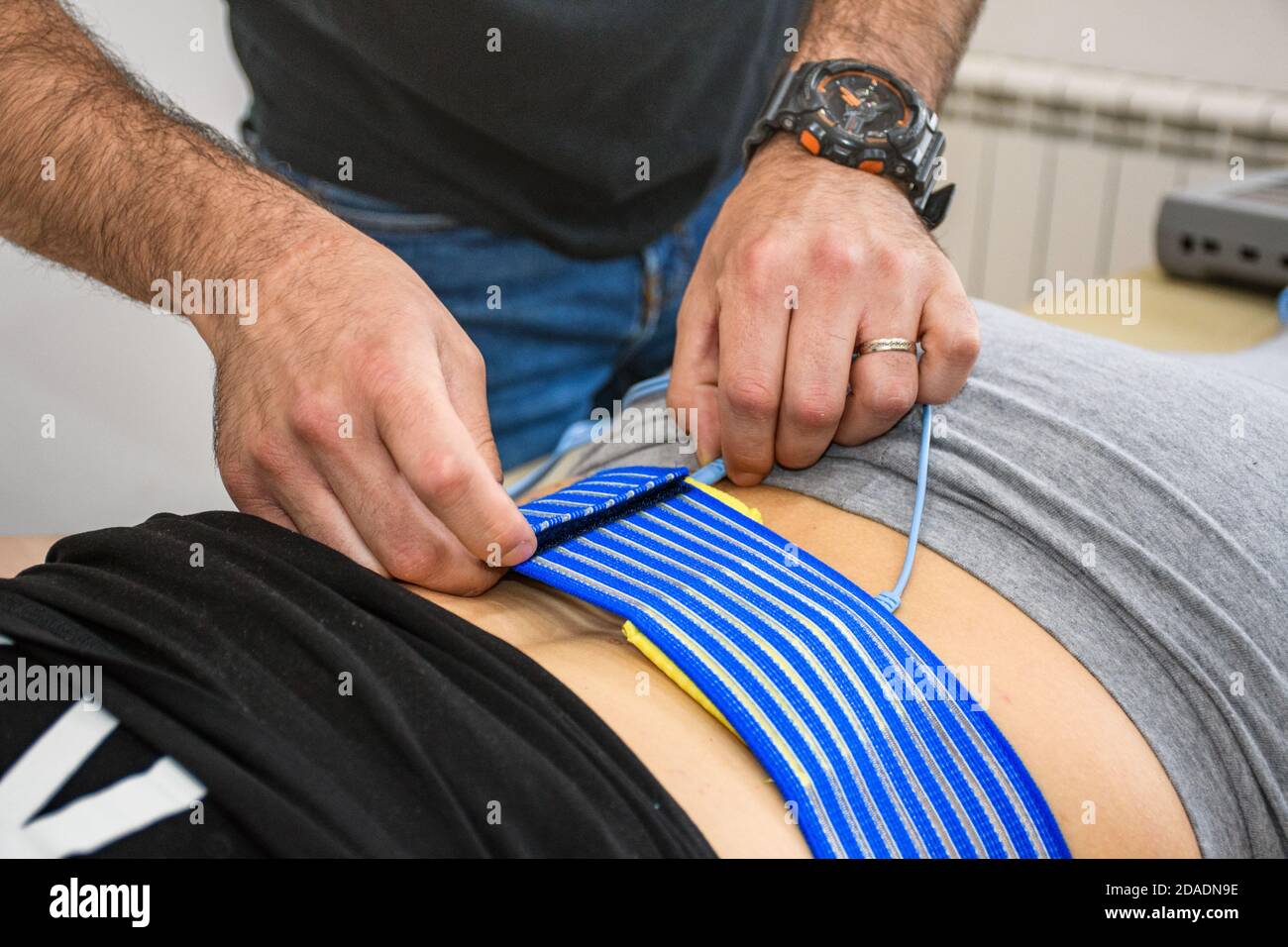 https://c8.alamy.com/comp/2DADN9E/zagreb-croatia-may-28-2019-person-getting-muscle-stimulator-attached-to-her-back-massage-stimulation-chiropractor-gym-fitness-back-pain-2DADN9E.jpg