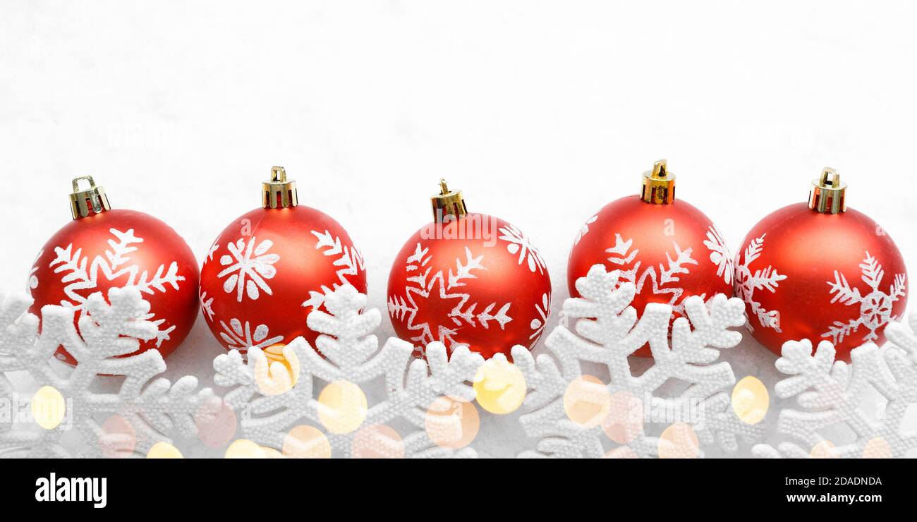 Christmas red balls with snowflakes on white background Stock Photo - Alamy