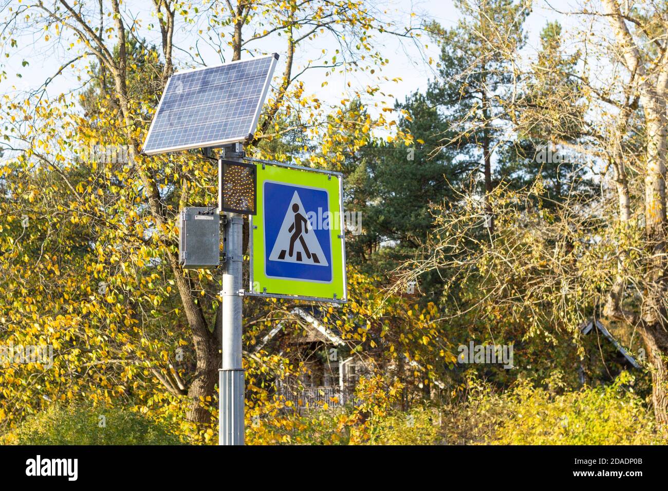 Pedestrian crossing road sign and solar-powered traffic light Stock ...