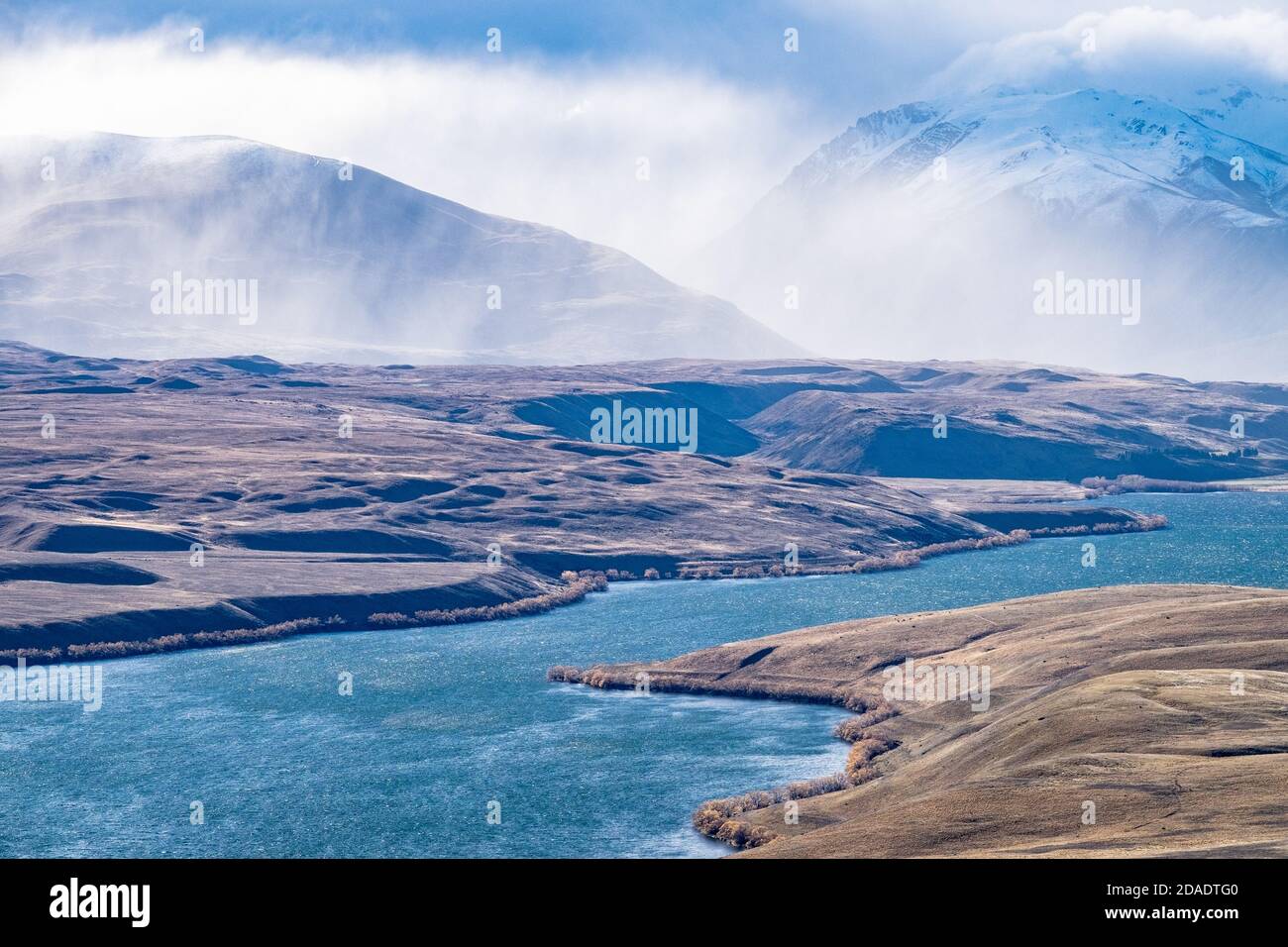 Lake Alexandrina looking towards storm clouds over Mount Joseph, Tekapo, New Zealand Stock Photo