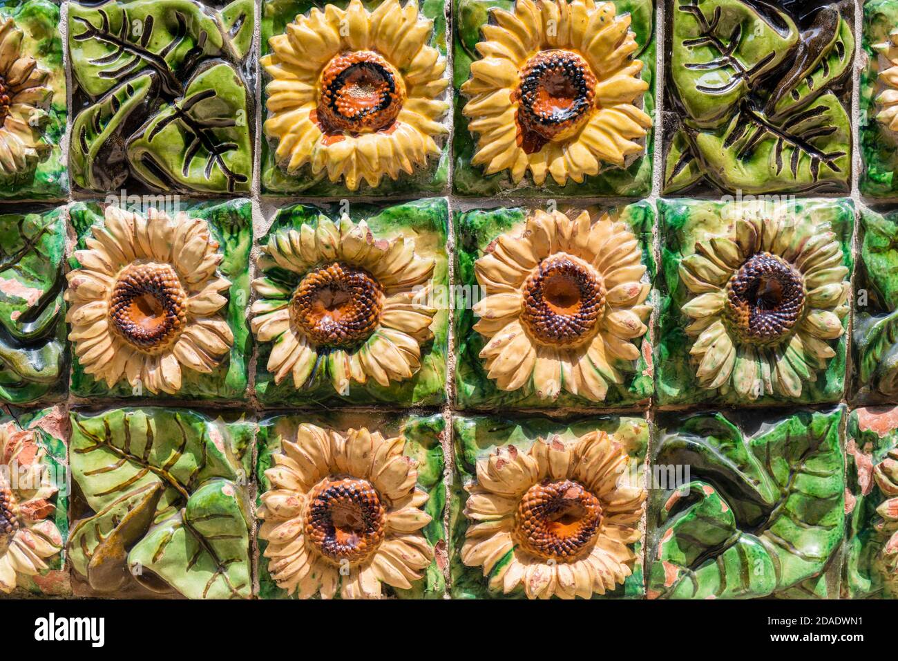 Decorative detail of sunflowers and leaves on Villa El Capricho designed by Catalan architect, Antoni Gaudi, in Comillas, Cantabria, Spain. Stock Photo