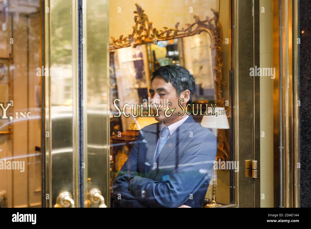 NEW YORK, USA - Sep 16, 2017: Manhattan street scene. Man in the luxury ...