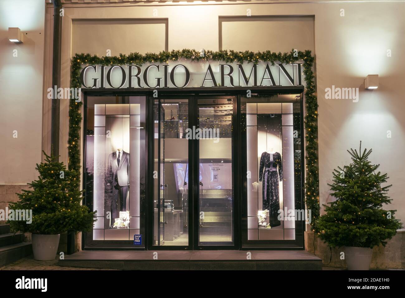 Giorgio Armani's Christmas store with mannequins in clothes. Entrance ...