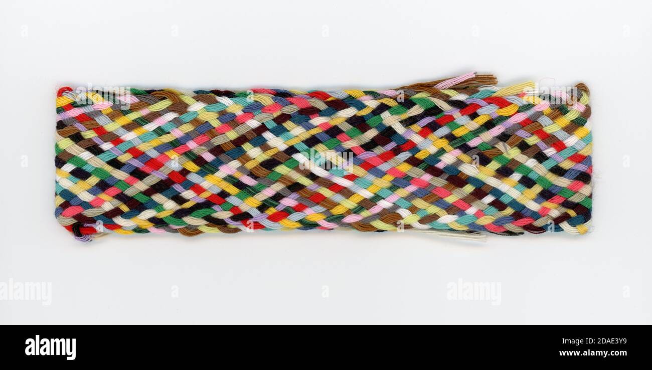 Sew thread plait with many different colours Stock Photo - Alamy