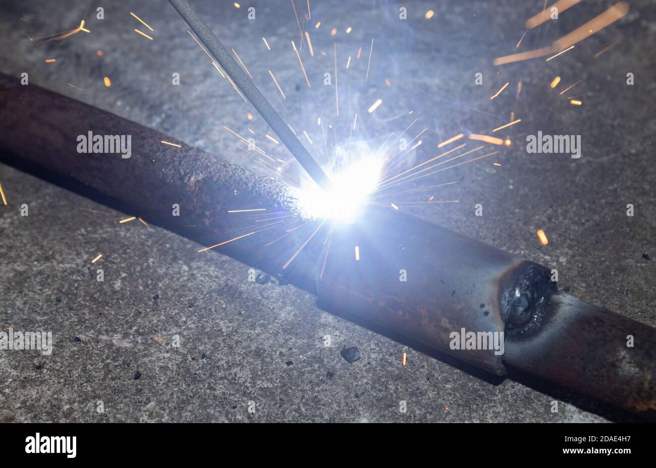 Welder Welding Car Part by Electrode Arc Welding Technique in Zoom View