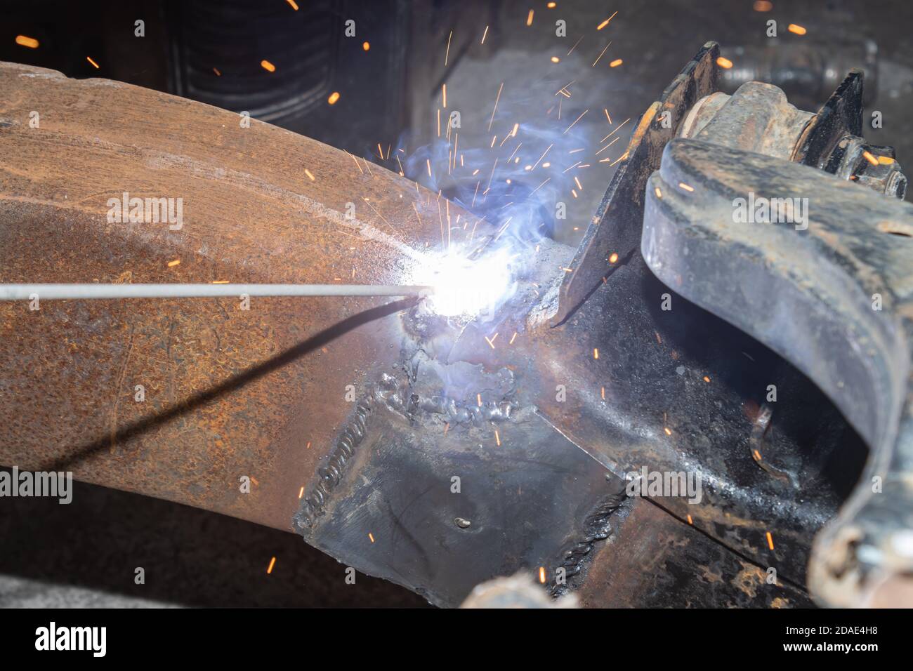 Welder Welding Bottom Car Chassis by Electric Welding Torch in Zoom