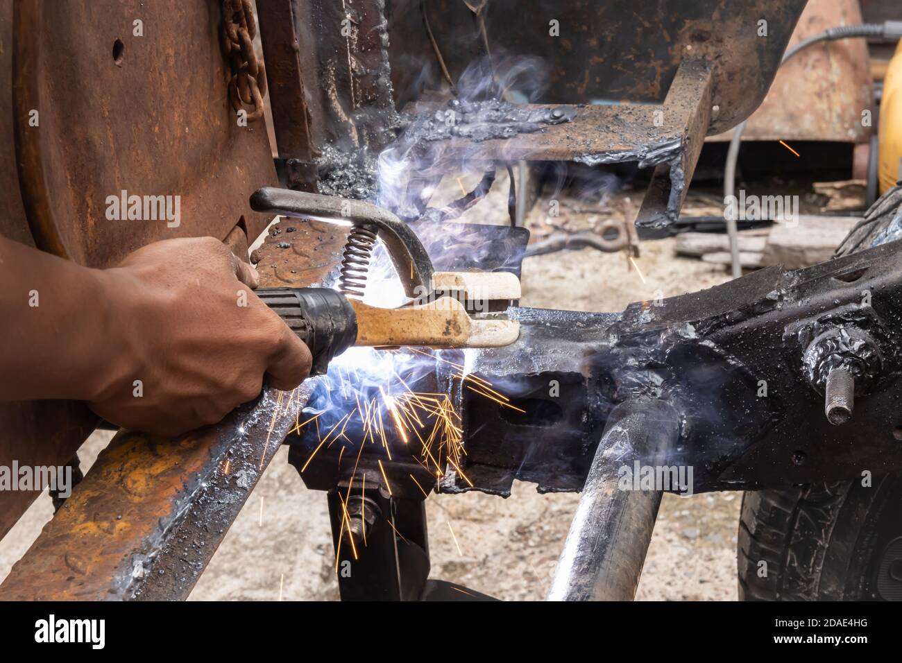 Welder Welding Rear Car Chassis by Electrode Arc Welding Technique by Torch Stock Photo Alamy