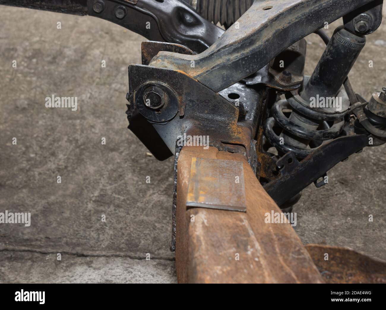 Car Lower Arm and Crack Car Chassis or Car Frame and Shock Absorber