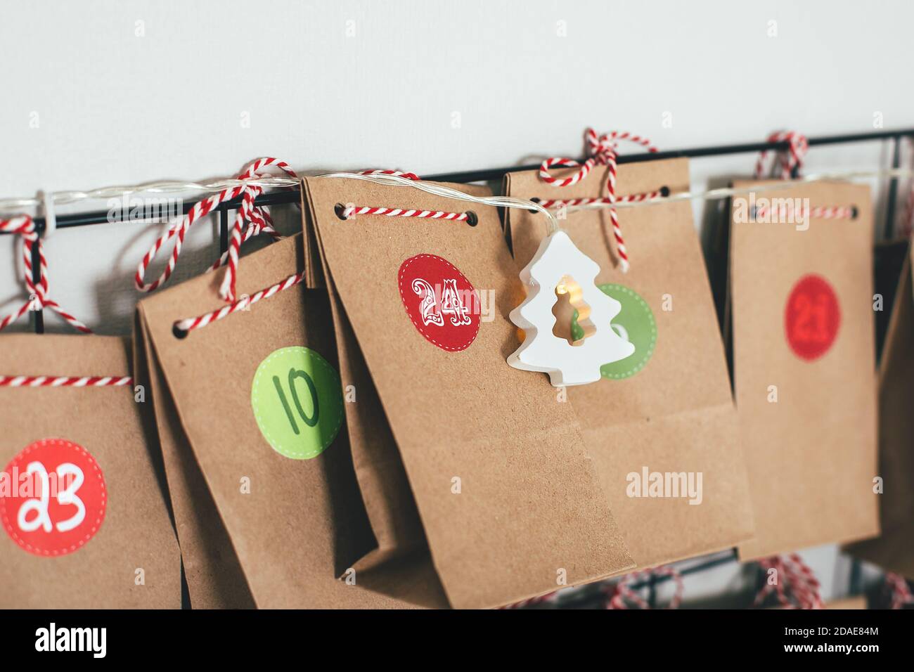 Christmas advent calendar. Eco paper bags with presents for kid's.  Sustainable christmas Stock Photo - Alamy