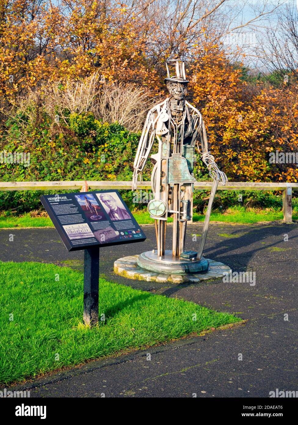 A sculpture made of machine parts representing Henry Pease prominent Quaker Victorian business man and founder of Saltburn in autumn light with trees Stock Photo