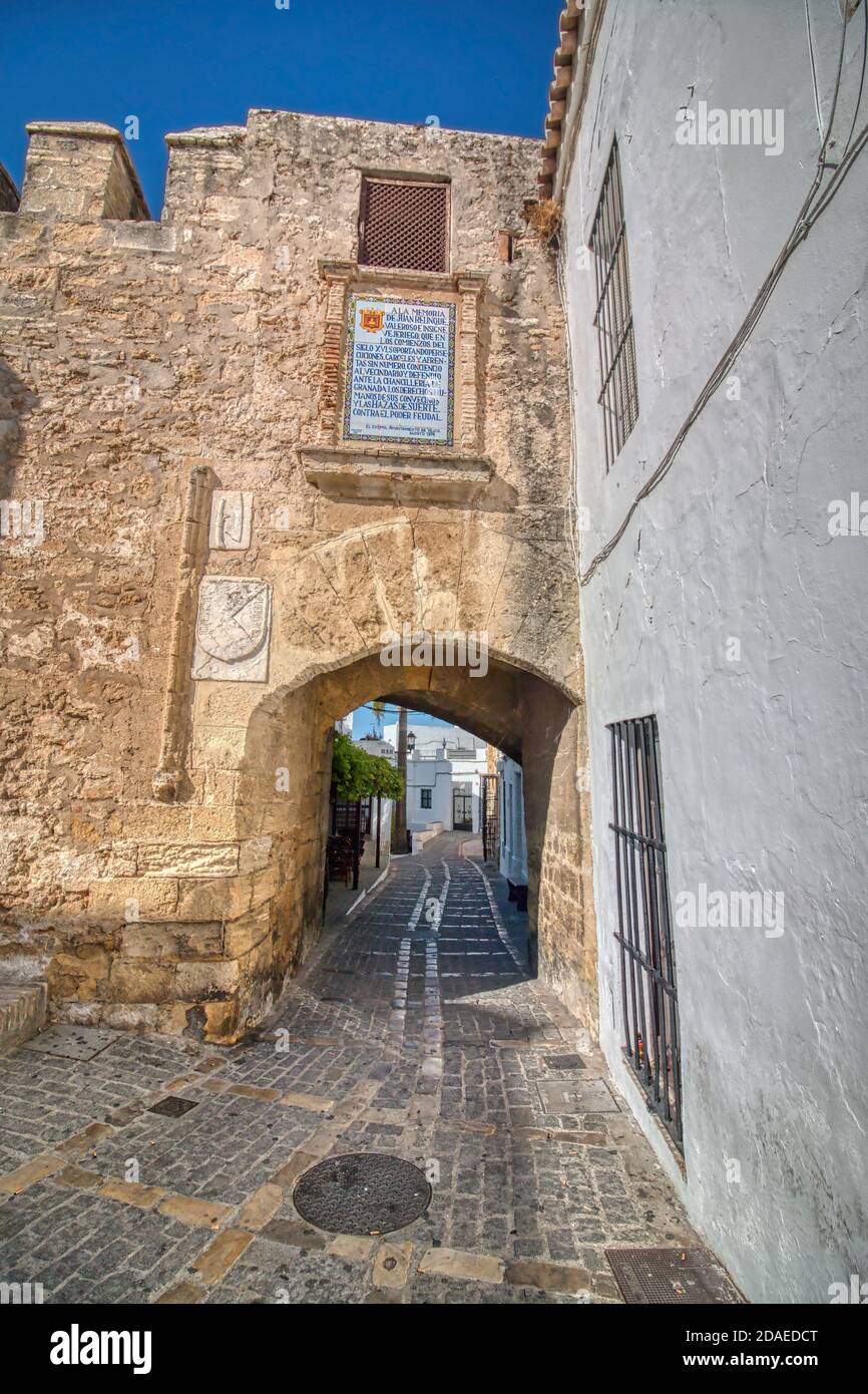 Vejer de la Frontera, Cádiz, Spain - October 06, 2019: Arch in the walled compound erected between the 10th and 12th centuries in this Stock Photo