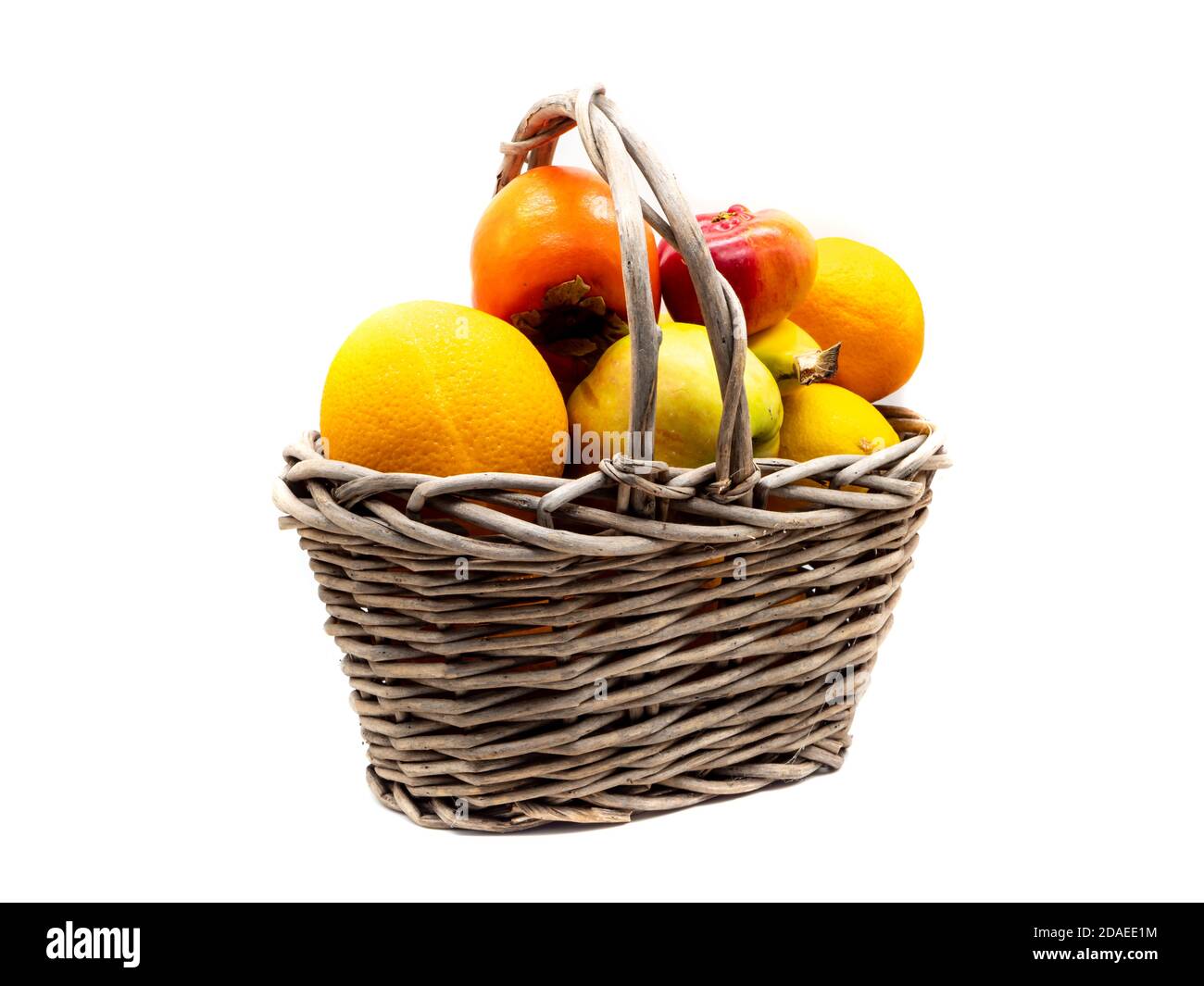 Fruit basket isolated on white background Stock Photo