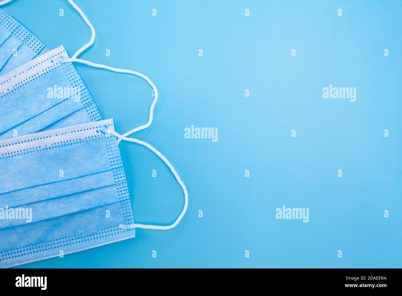 Blue medical masks hi-res stock photography and images - Alamy