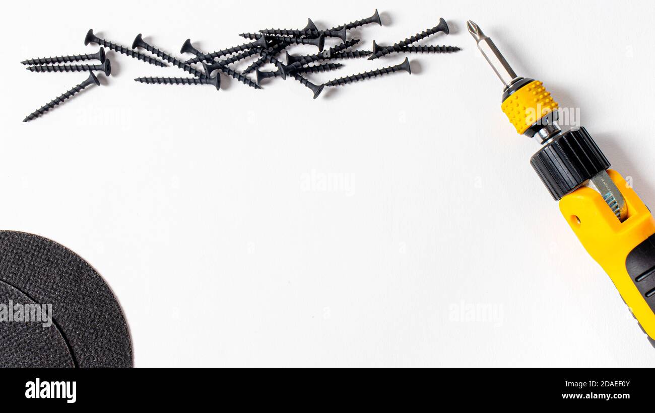 Self-cutters and screwdriver on a white background banner with a place for copyspace text for the construction store Stock Photo