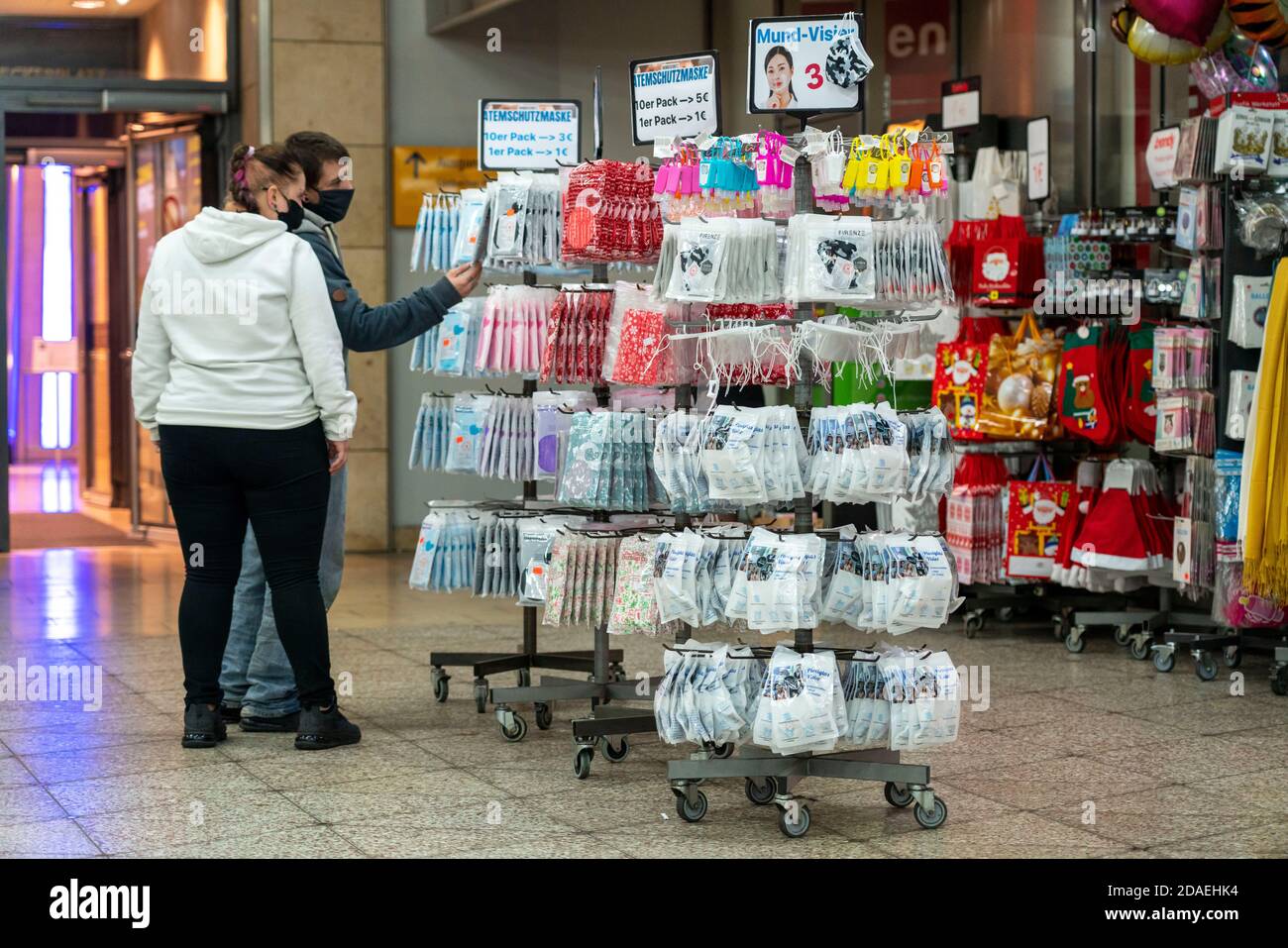 Sales stand with masks, mouth-and-nose protection, disposable masks, fabric masks, in the underground station in Essen, NRW, Germany Stock Photo