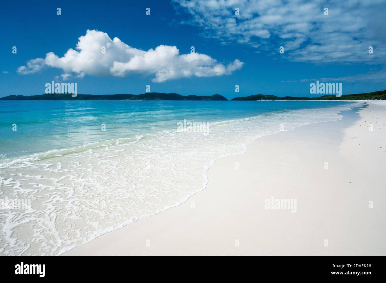 Whitehaven Beach is the whitest beach in the world due to its 99% silica sand. Stock Photo