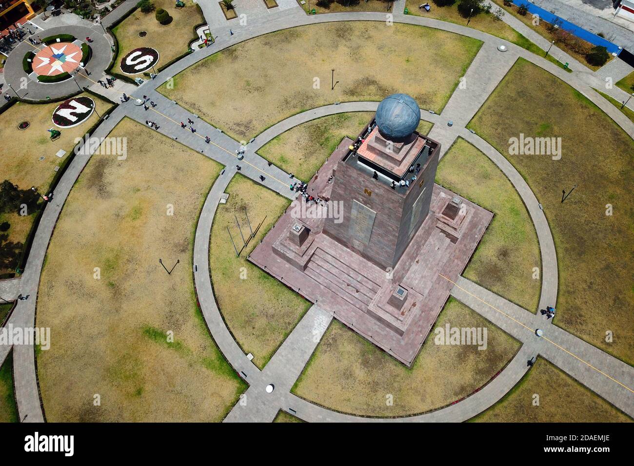 Aerial shot of the Monument of the Equator, Ciudad Mitad del Mundo nearby Quito, Ecuador marking the equator line, dividing the North and South hemisp Stock Photo