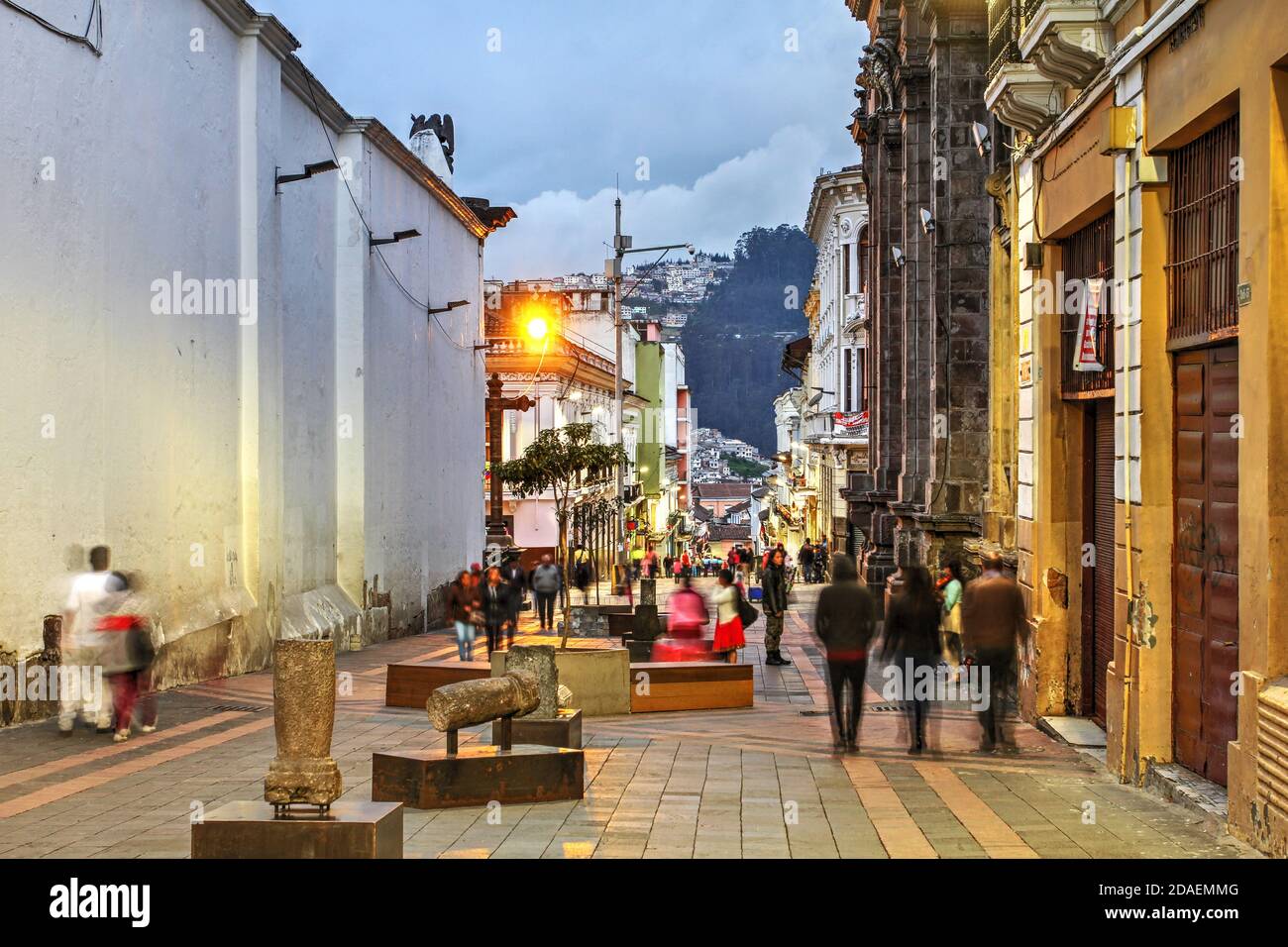 Evening street scene along Calle Sucre, one of the numerous streets in the historic center of Quito, Ecuador, one of the best preserved in South Ameri Stock Photo
