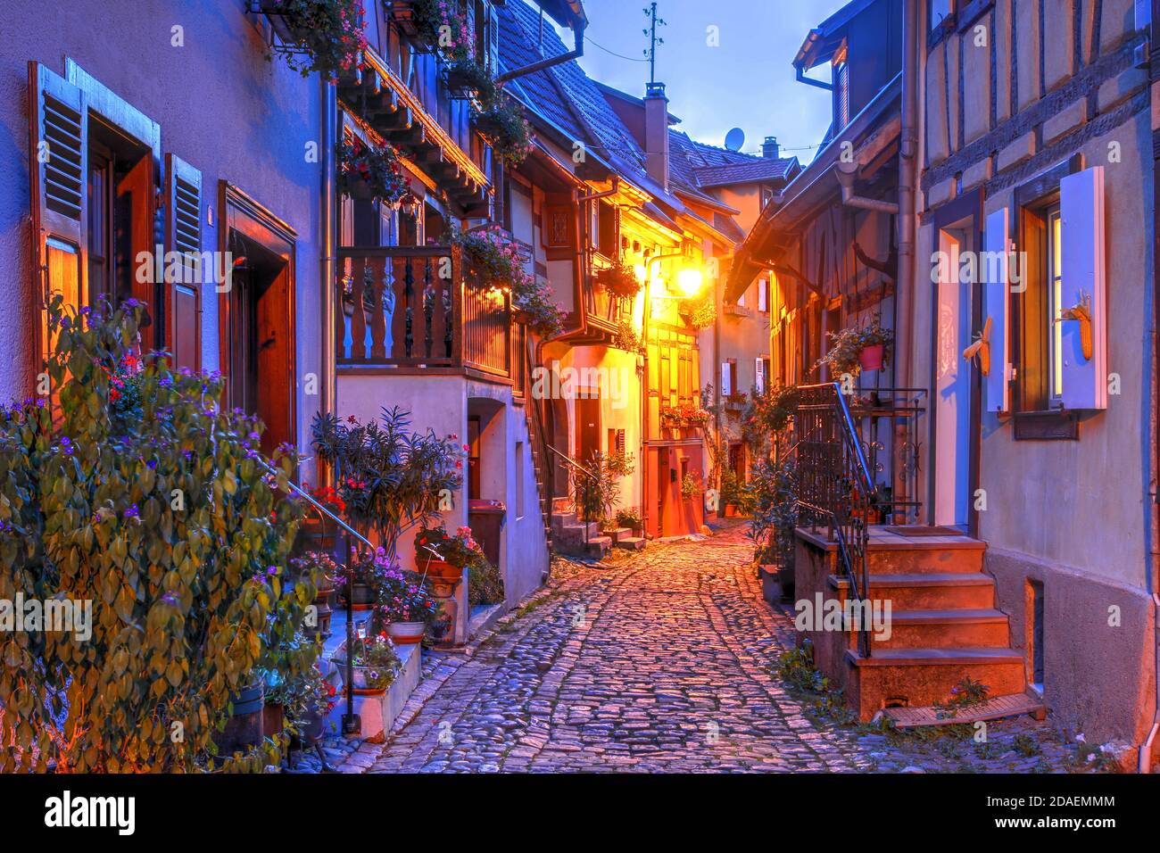 Night scene on the charming streets of Eguisheim, a typical village in the Alsace wine region of France. Stock Photo