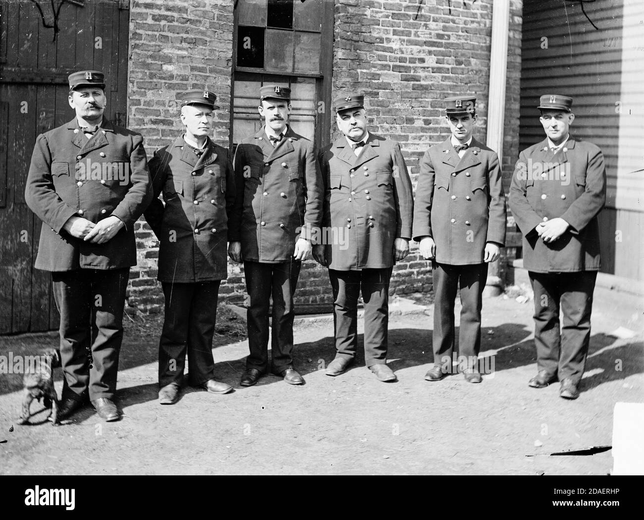 Image of seven firemen from Engine Company number eight standing