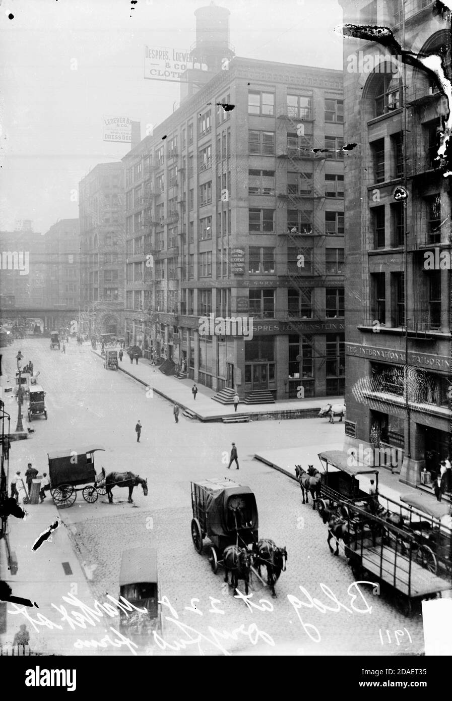 Building at 228 Market Street, viewed from across Market Street with various horse drawn vehicles on the street in the foreground. Stock Photo