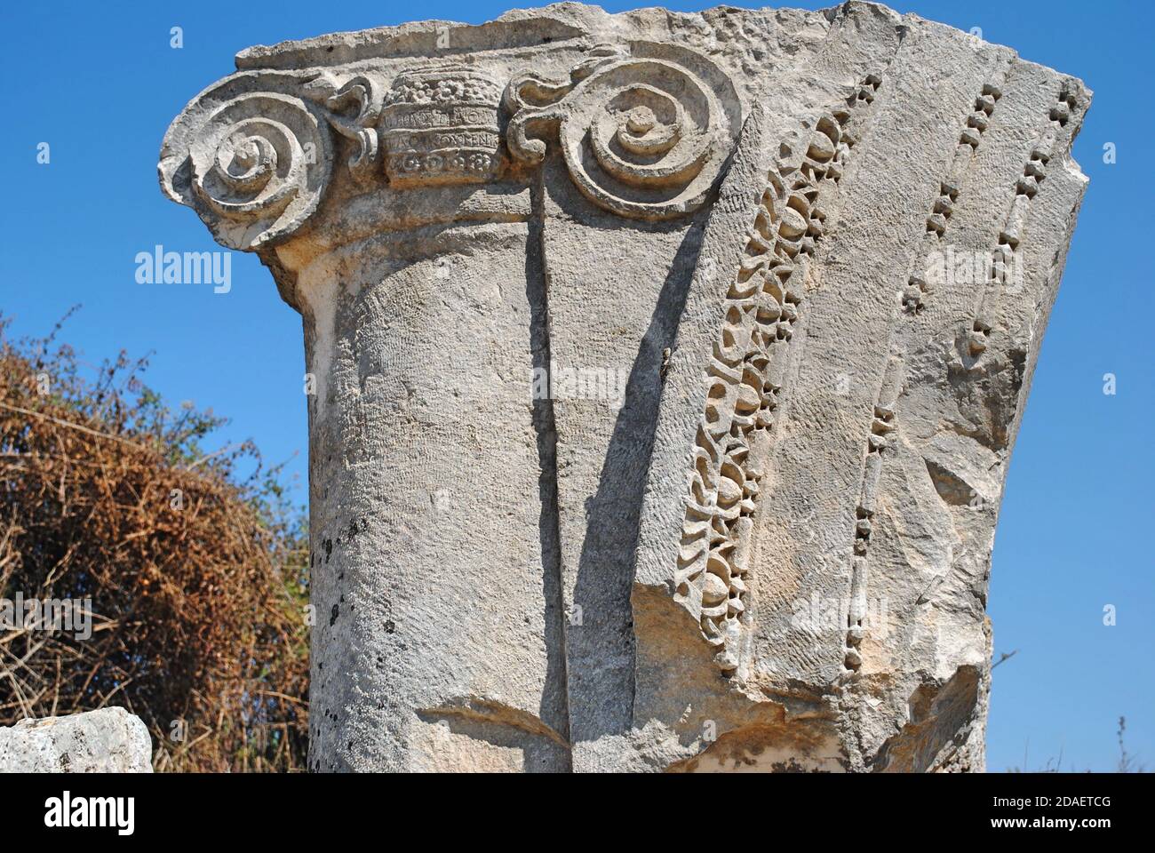 Close up of an Ionic marble column at ruin ancient city of Perge, near Antaliya, Turkey.  Stock Photo