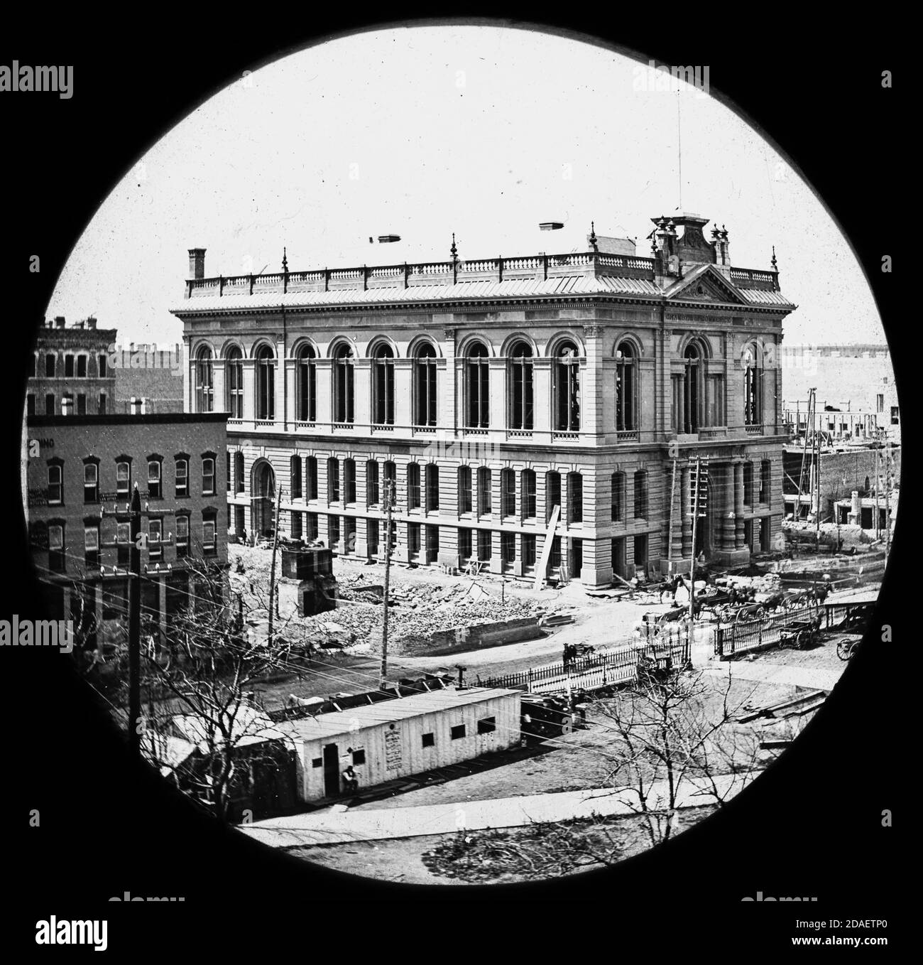 Exterior view of the Chamber of Commerce building being rebuilt after the Chicago Fire of 1871. Stock Photo