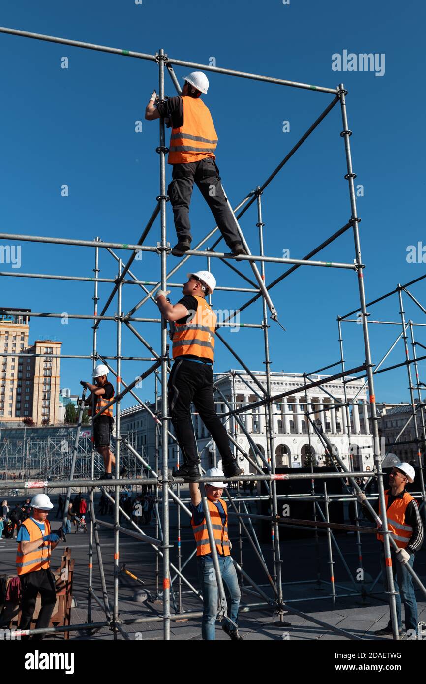 KYIV, UKRAINE - May 03, 2017: Worker prepares billboard to installing new advertisement on the Independence Square in Kyiv Stock Photo