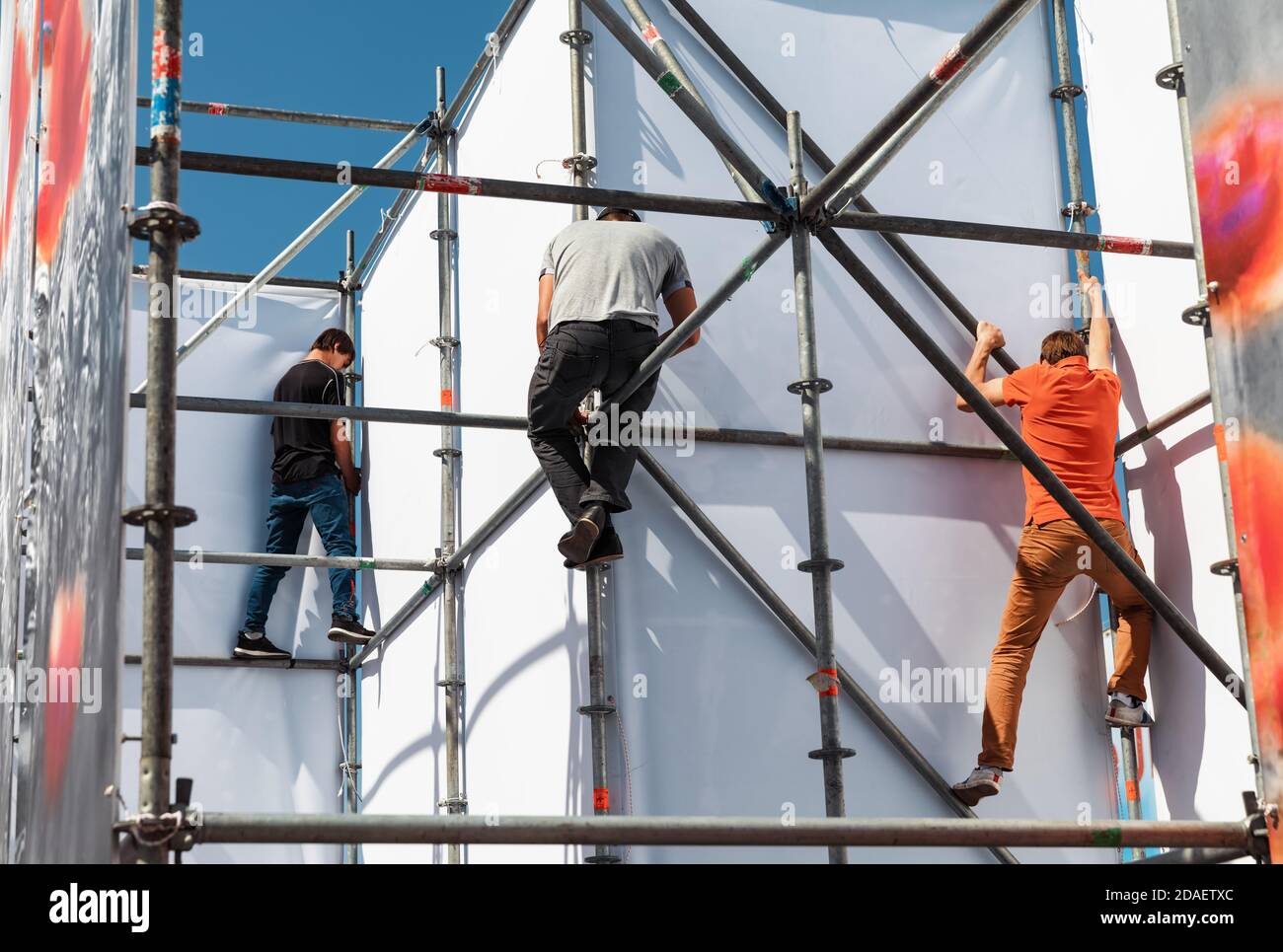 KYIV, UKRAINE - May 05, 2017: Worker prepares billboard to installing new advertisement on the Independence Square in Kyiv Stock Photo