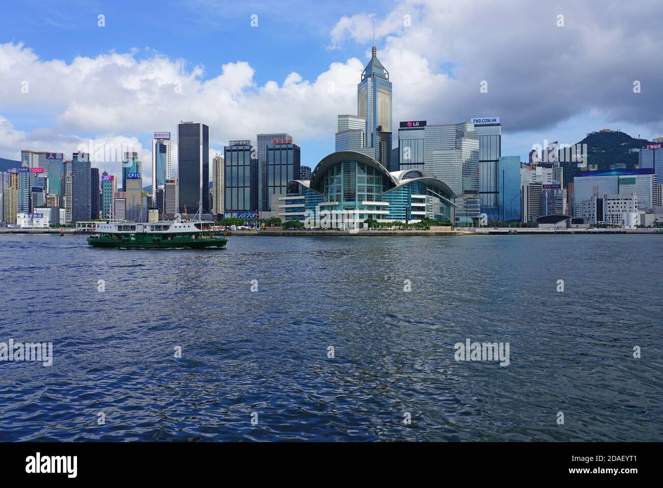 HONG KONG -29 JUN 2019- View of a Star Ferry ship in the Victoria Harbor in Hong Kong between Hong Kong and Kowloon in front of the Wan Chai conventio Stock Photo
