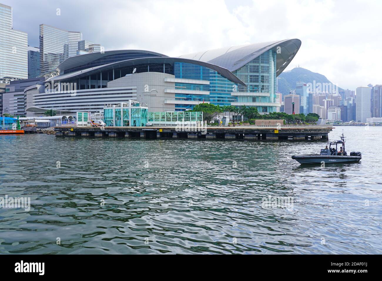 HONG KONG -29 JUN 2019- View of a Hong Kong police boat in the Victoria between Hong Kong and Kowloon in front of the Wan Chai Convention Center in Ju Stock Photo