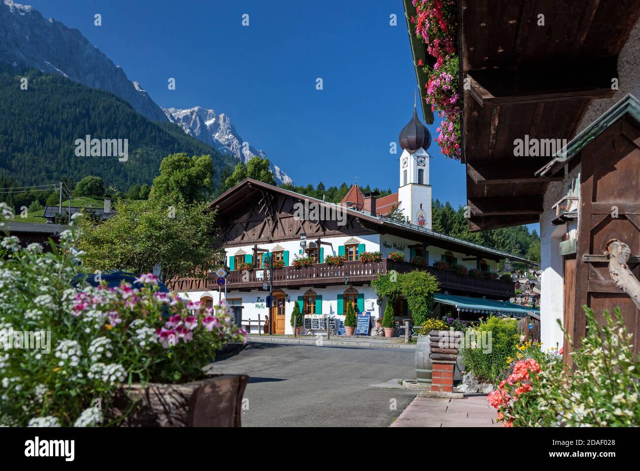 geography / travel, Germany, Bavaria, Grainau, church St. Johannes in Grainau in front of Zugspitze (p, Additional-Rights-Clearance-Info-Not-Available Stock Photo