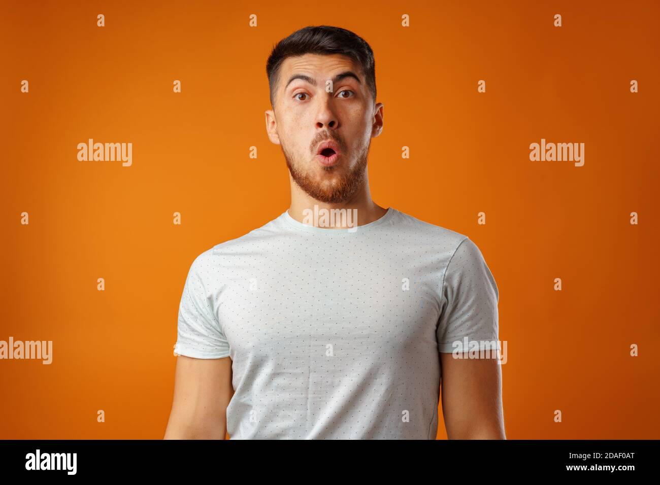 Amazed confused bearded young hi-res stock photography and images - Alamy