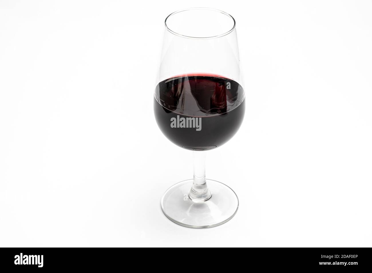 Glass of vintage ruby port wine isolated on white background close up Stock Photo