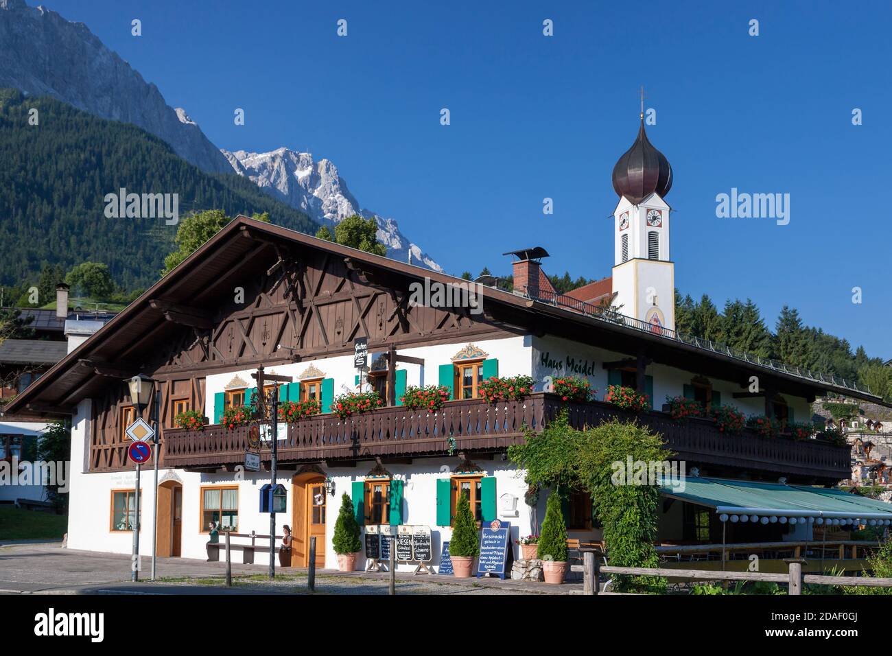 geography / travel, Germany, Bavaria, Grainau, church St. Johannes in Grainau in front of Zugspitze (p, Additional-Rights-Clearance-Info-Not-Available Stock Photo