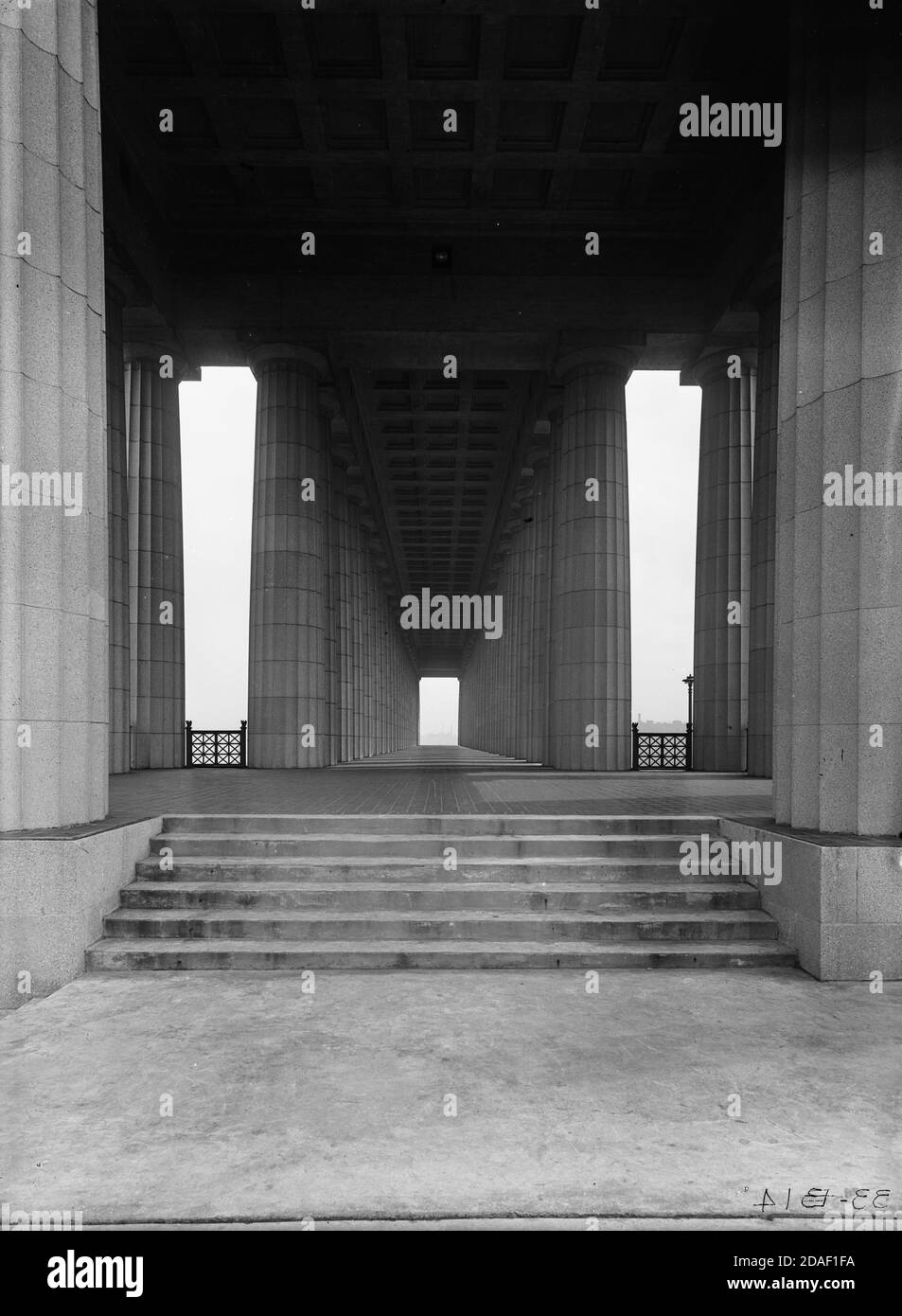 Symmetrical vista through colonnade at Soldier Field or Grant Park Stadium, architect Holabird and Roche, in Chicago, Illinois, circa 1924. Stock Photo