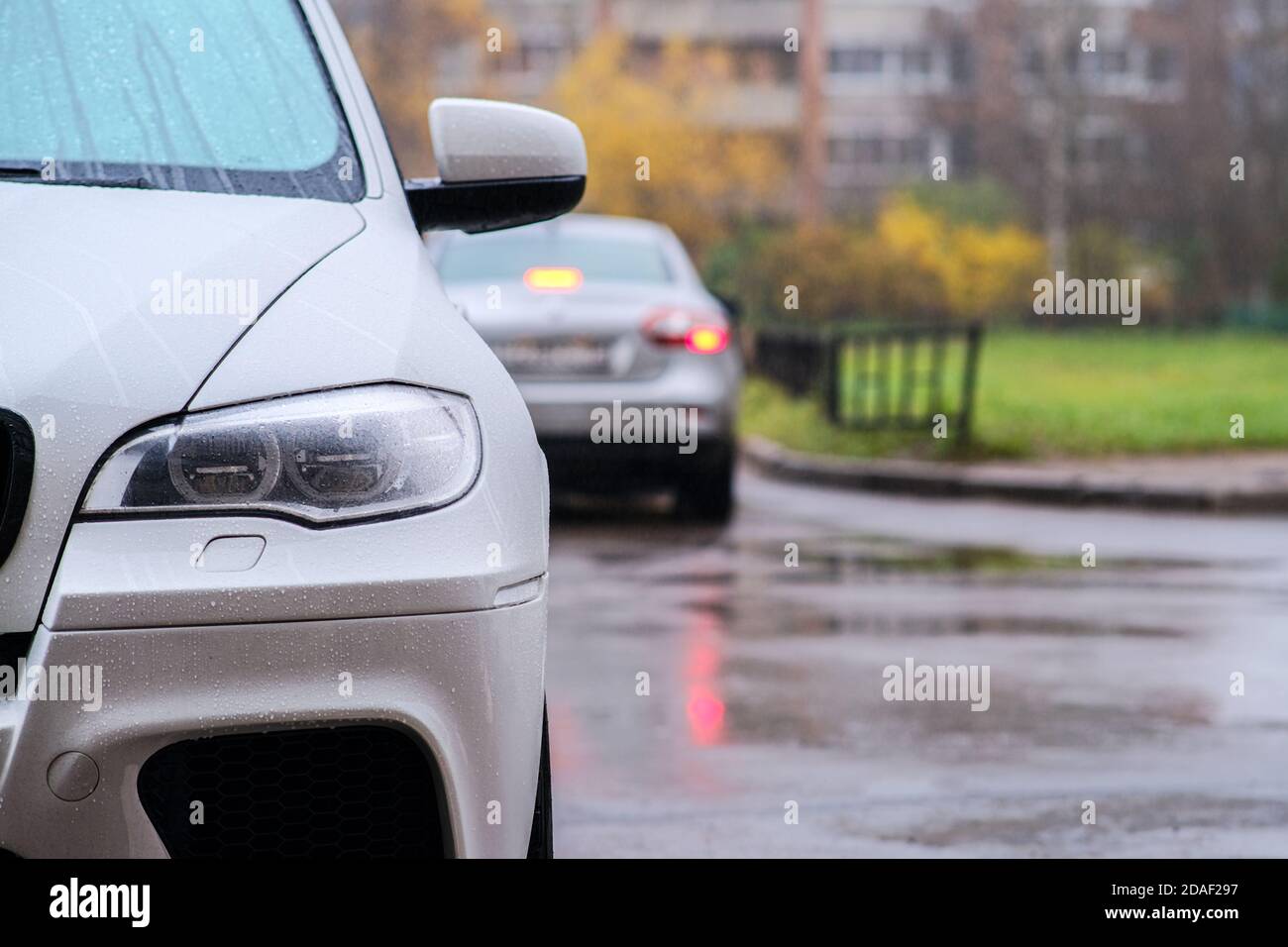 Collision of two cars at the turn of the intersection. Car accident on the street Stock Photo
