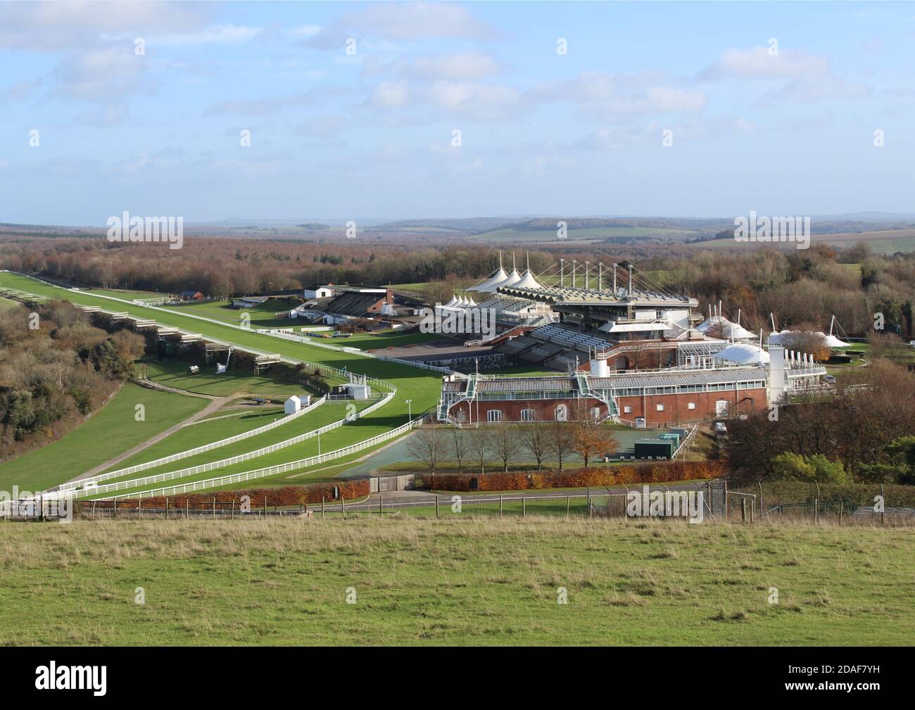 Goodwood race course near Chichester, West Sussex as seen from the nearby vantage point the trundle. Stock Photo