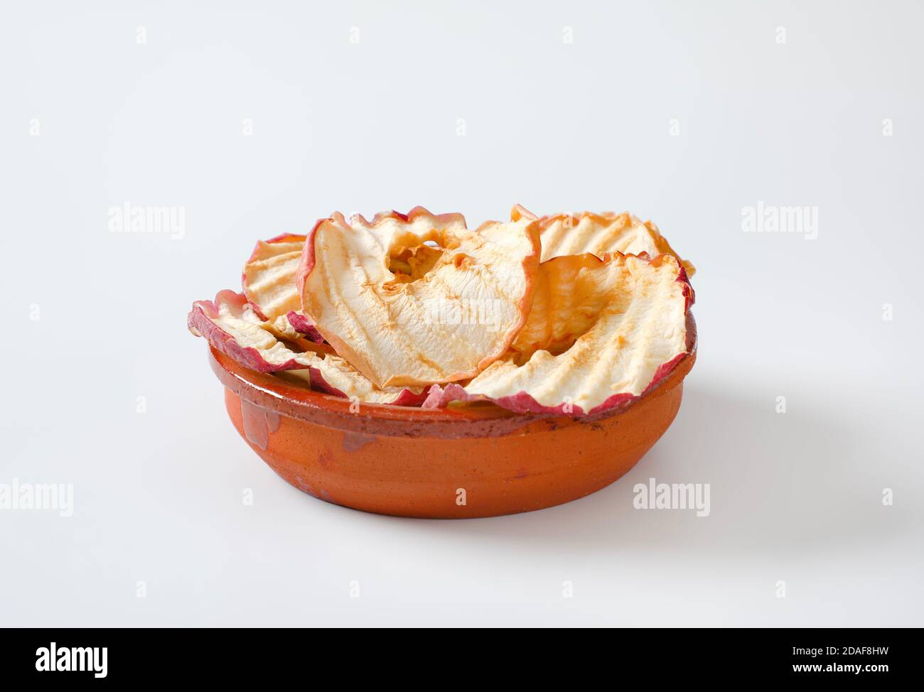 Bowl of dried apple slices - apple chips or rings Stock Photo