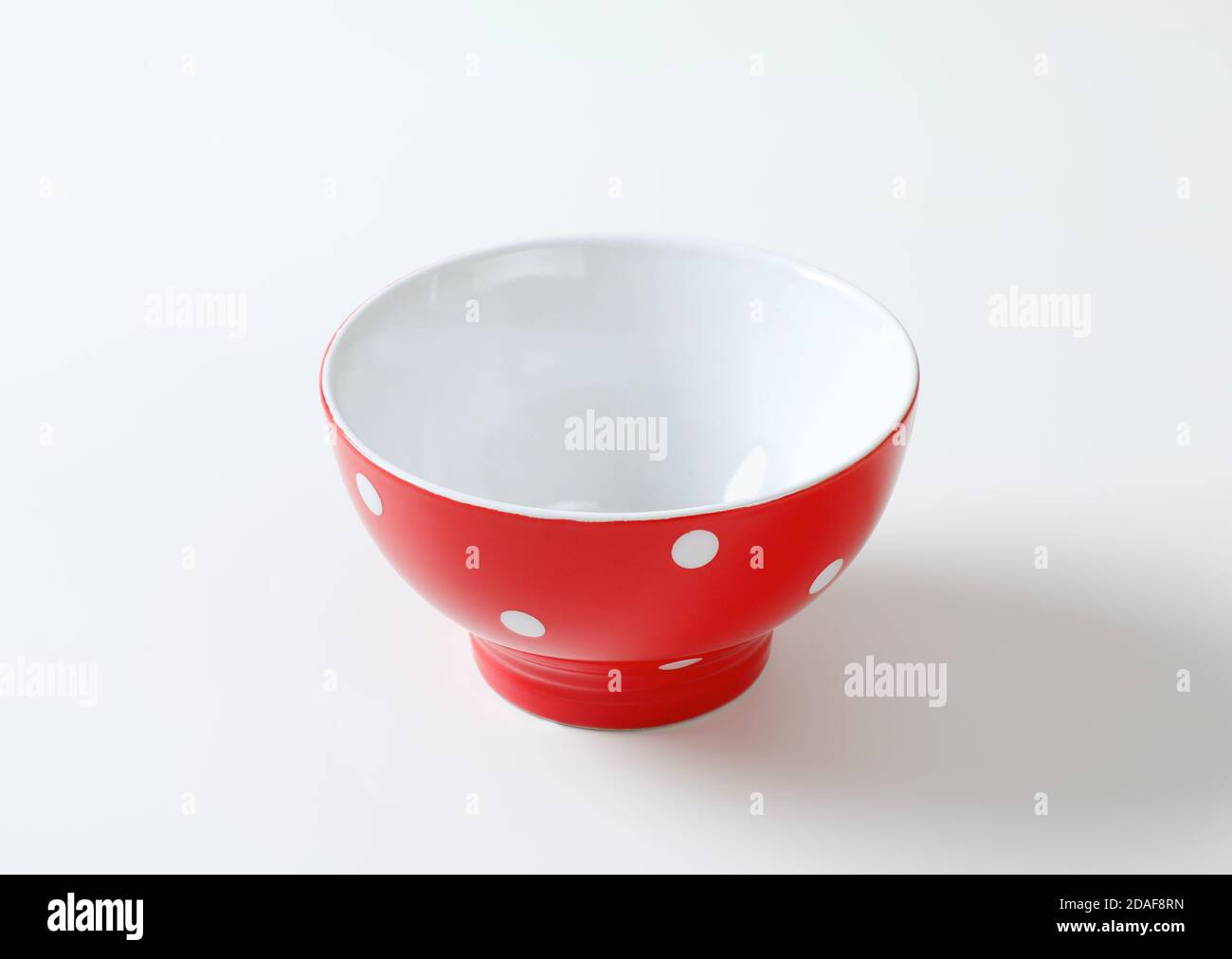 Ceramic red and white polka dot breakfast or rice bowl Stock Photo