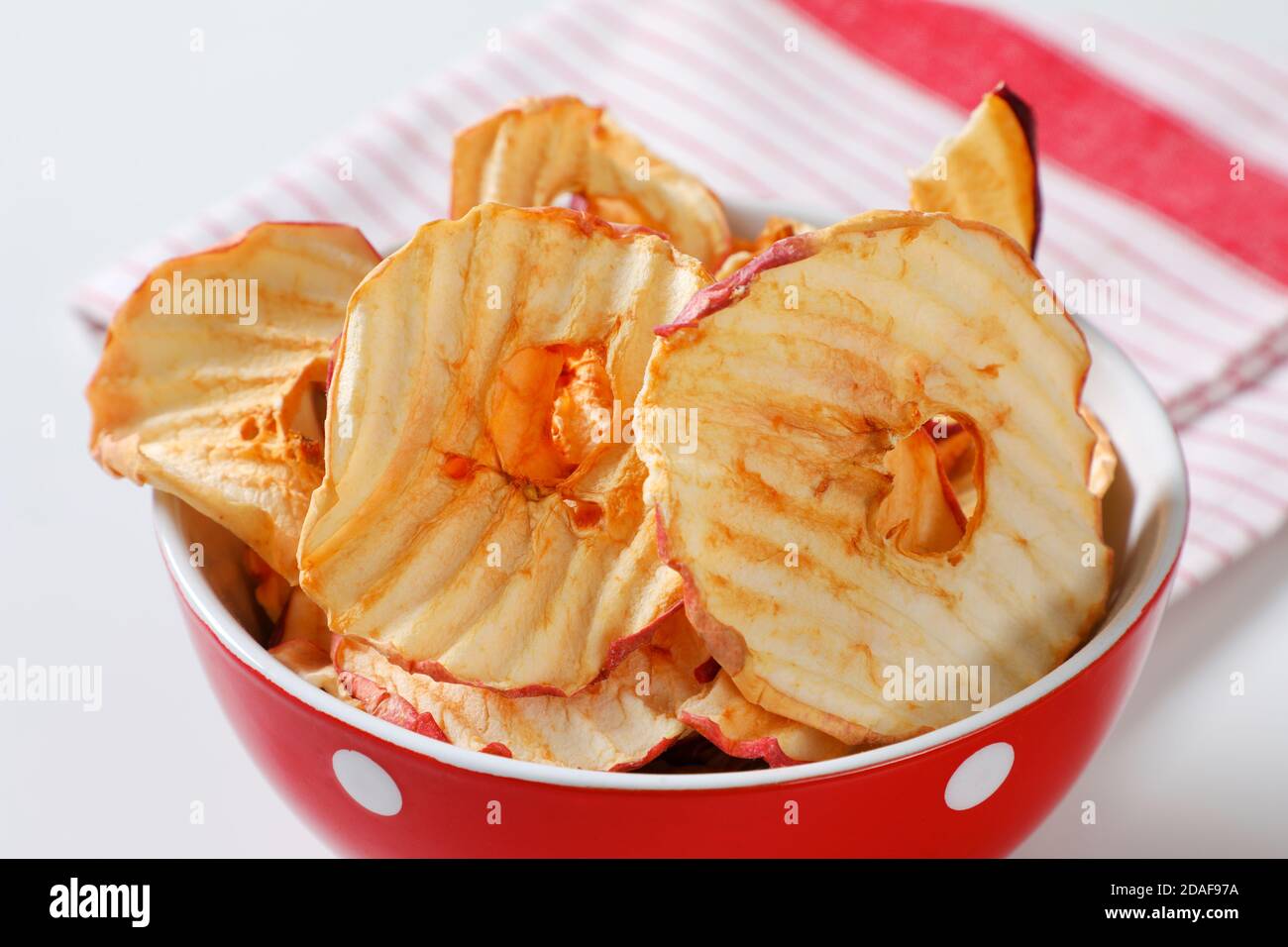 Bowl of dried apple slices - apple chips or rings Stock Photo