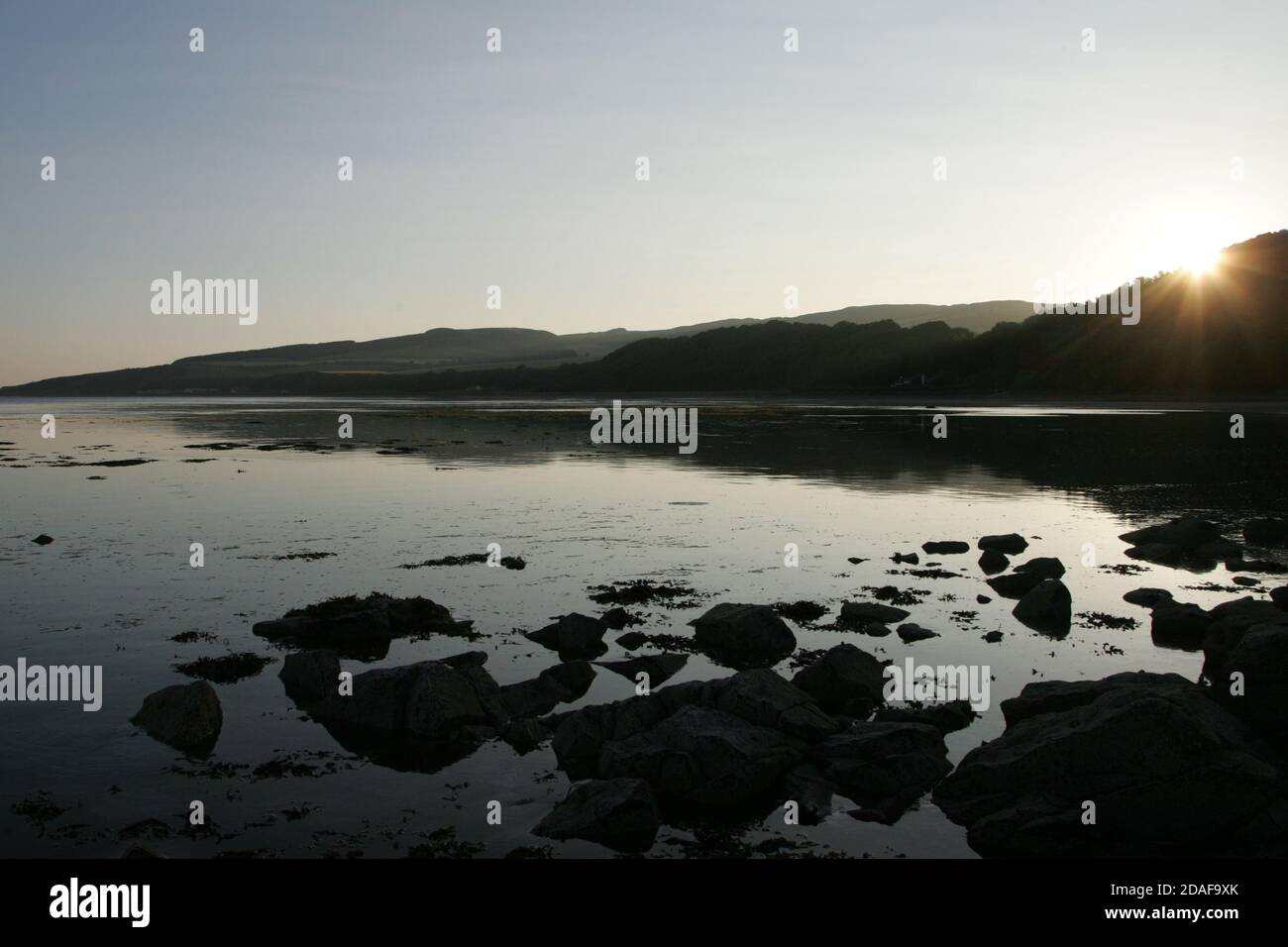 Croy Shore, Ayrshire, Scotland, Early morning light illuminates the beach at Croy as seen from Culzean Castle Stock Photo