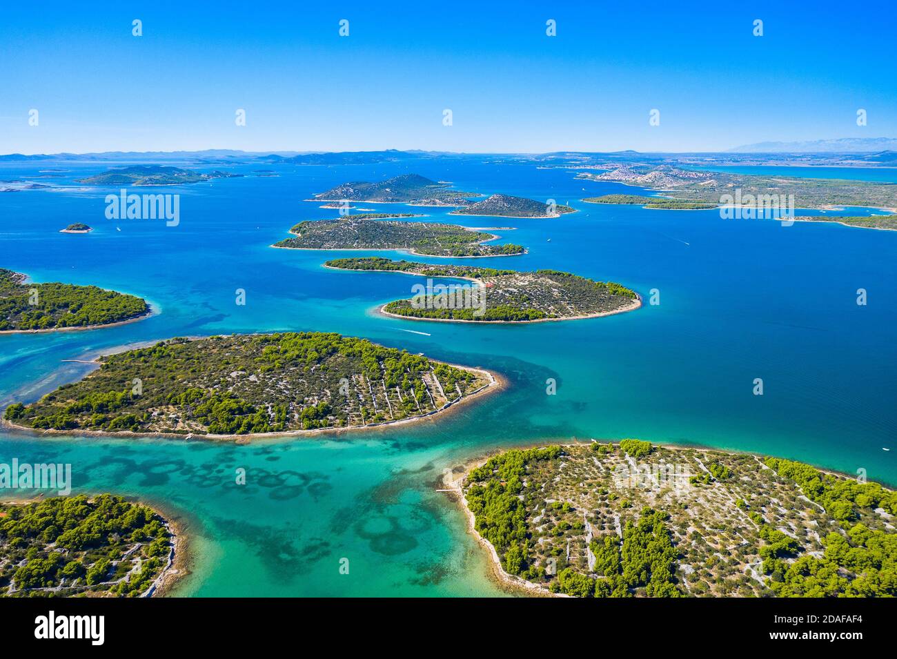 Wonderful coastline seascape, small Mediterranean stone islands in Murter archipelago, aerial view of turquoise bays from drone, Dalmatia, Croatia Stock Photo